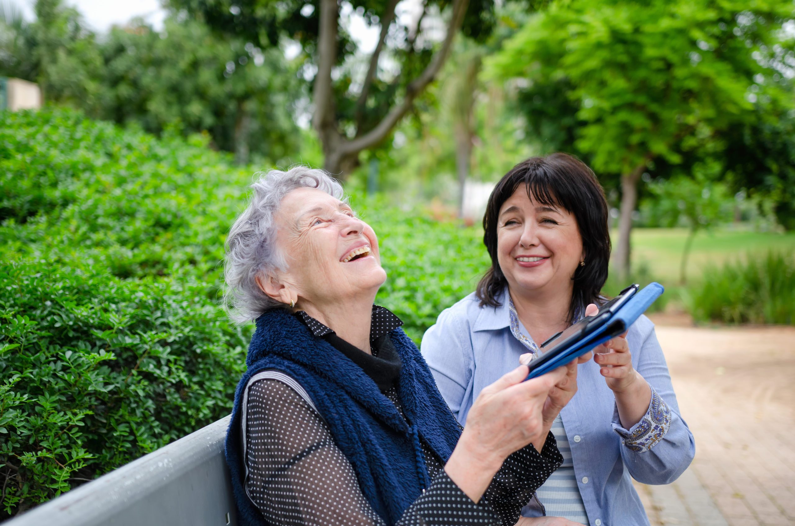 Senior woman is happy with the first success in using the tablet